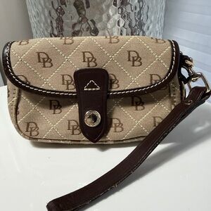 Dooney & Bourke Signature Flap Wristlet Like New
